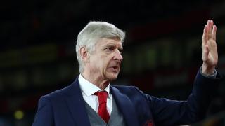 Arsene Wenger waving
